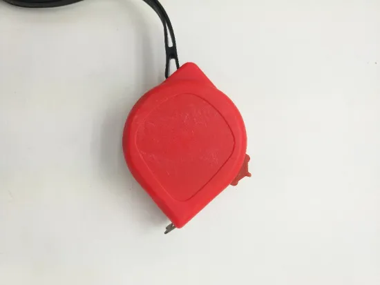 Tape measure of small red leaves