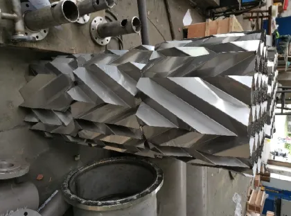 Corrugated plates gas-liquid mixer