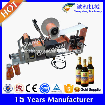 China supplier manual botella labeler