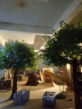 Realistic artificial ficus tree for restaurant decoration