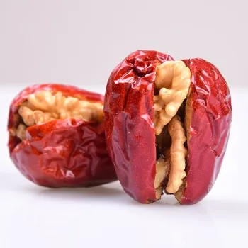 Walnut halves tasty snack nuts with red date