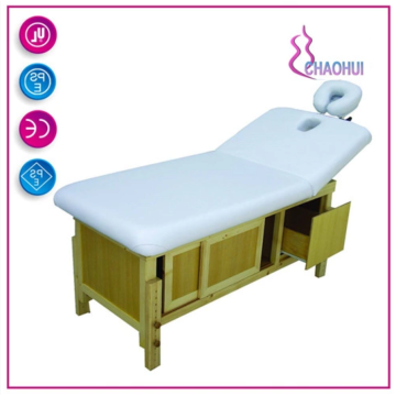 Quality wooden massage table in beauty salon