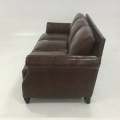 Three person shiny leather sofa