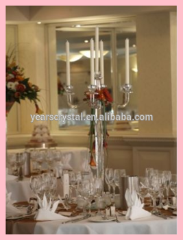 Tall crystal candelabra with flower bowl for wedding event