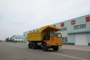 Off-highway wide-body mining dump truck/