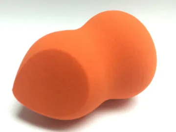 Orange angle cut pear shape makeup sponge applicator