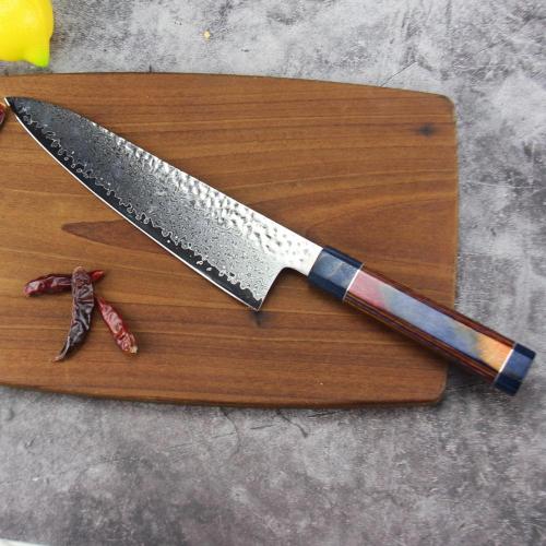 Cuchillo de cocina de acero de damasco forjado hecho a mano.