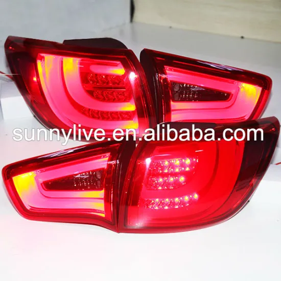 KIA SPORTAGE SPOTRAGR R 2011-2013 REAR LAMP KA054-B8DE4 RED SMOKE LF" could be simplified to "KIA SPORTAGE Rear Lamp KA054-B8DE4 Red Smoke LF 2011-2013". However, for a search engine title, we might want it to be more concise. A suitable title could be:


