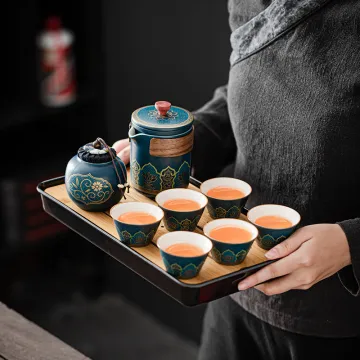 Travel-friendly Chinese Tea Set: Portable All-in-One Gift Bag with Ceramic Teapot, Porcelain Cups, Infuser, and Tray