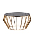 Mesa de acento de oro geométrico con vidrio gris ahumado