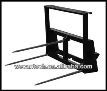 Skid steer loader attachment silage spear
