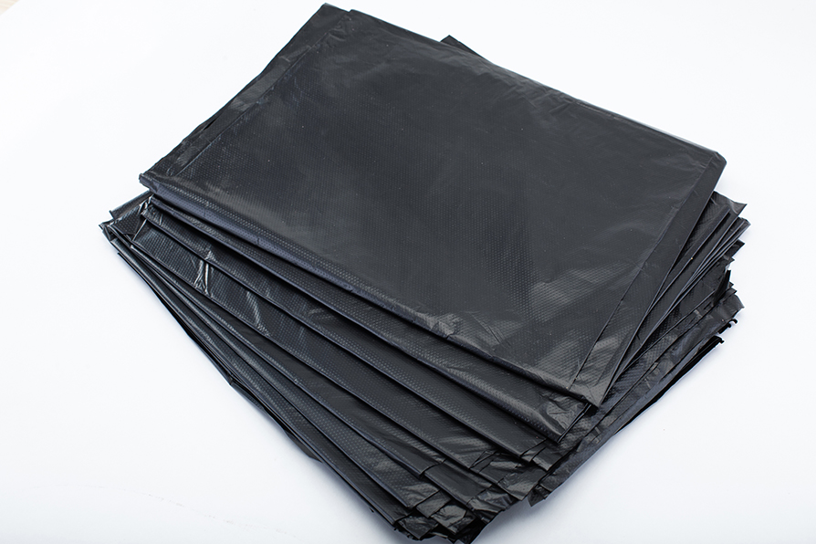 PE Black Plastic Garbage Bag on Sheet