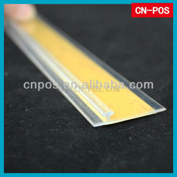 displayed plastic shelf rails with adhesive tape