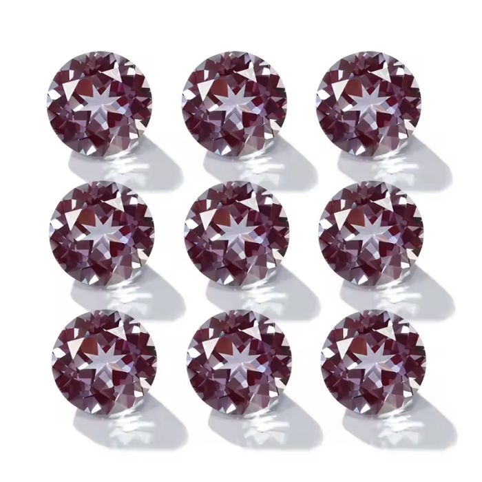 Lab lumago round cut Emerald at Sapphire