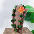 Hand-made Kukui Ti Leaf Mango Shell Lei