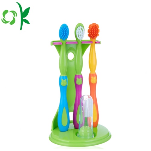 Brosse dentaire dentaire de soin oral de brosse à dents d&#39;enfants de silicone de 100%