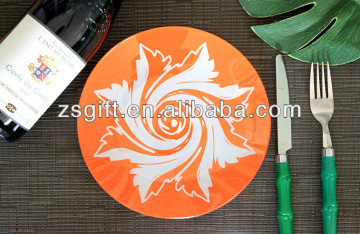 Red round glass plate