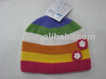 knitted girls' hat with hand crochet flower