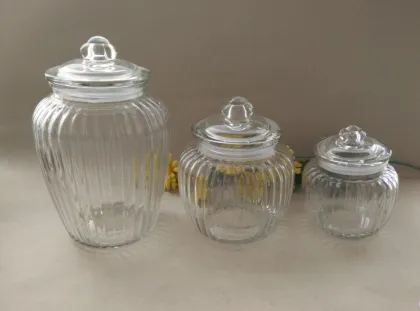 glass hurricane lamps, colored glass canisters