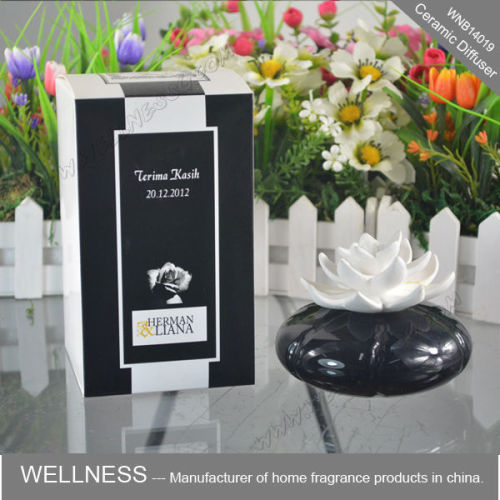 white flower shaped ceramic holder aroma diffuser