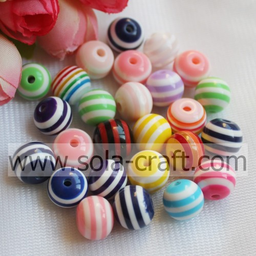 Venta al por mayor de perlas de resina de colores de rayas sueltas perlas redondas espaciador