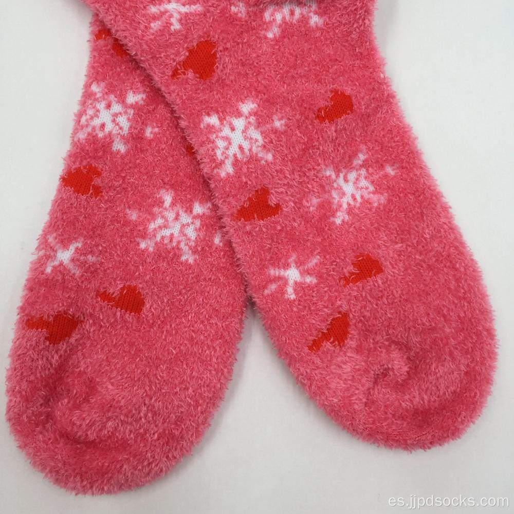 Calcetines acogedores de invierno de nieve rosa