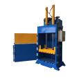 Vertical hydraulic baling machine for waste paper