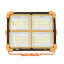 Portable solar camping light with handle