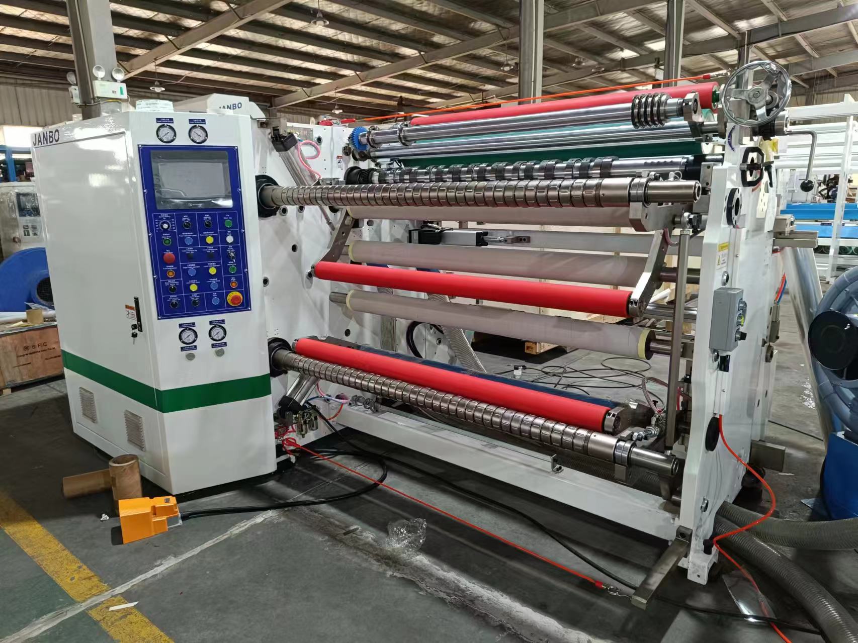 Integrated dual axis center slitting machine