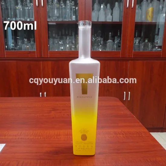 Yellow color painted 70cl square glass bottle with cork for whiskey