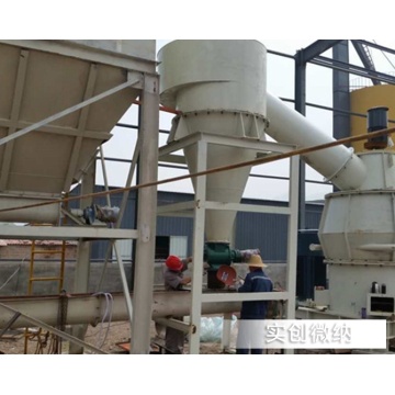 Large impact mill for powders