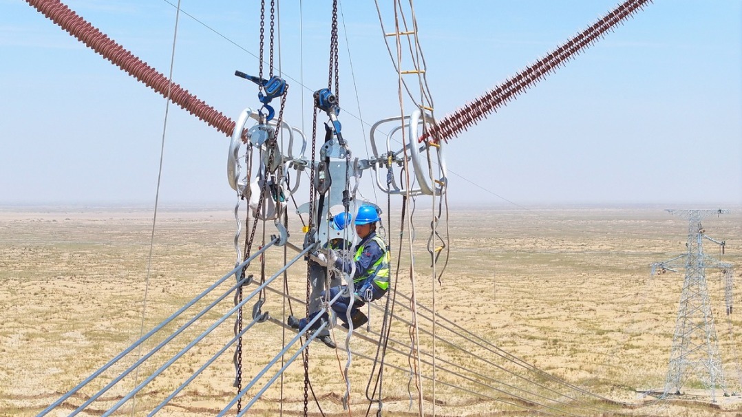 Power workers in desert areas