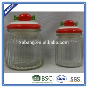 christmas glass candy jar with candy lid adornment