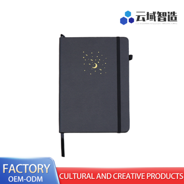 Edição de capa dura Green Moon com páginas internas pautadas