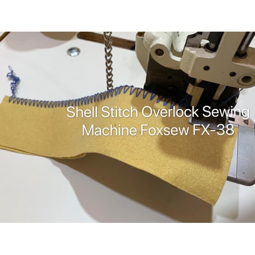 Machine à coudre à point surjet moyen