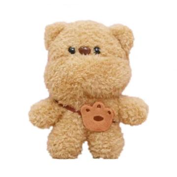 Decoração de sofá de urso marrom mala