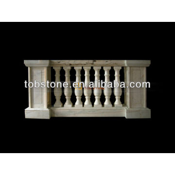 white marble balustrades and handrails