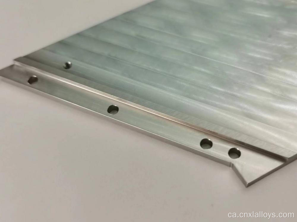 Materials de gravetat d'alta especificació basats en tungstè