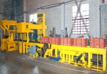 Automated sheet strapping machine
