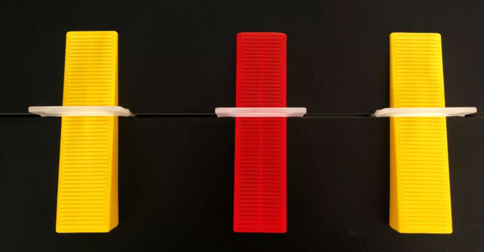Common wall tile gap leveler