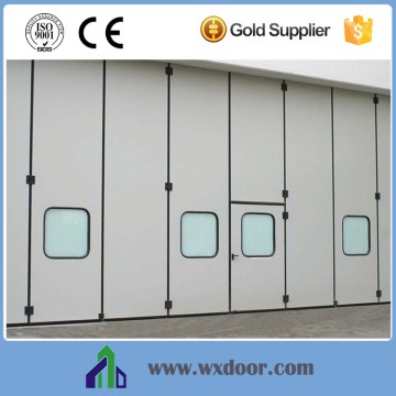 Electric industrial horizontal folding hangar door