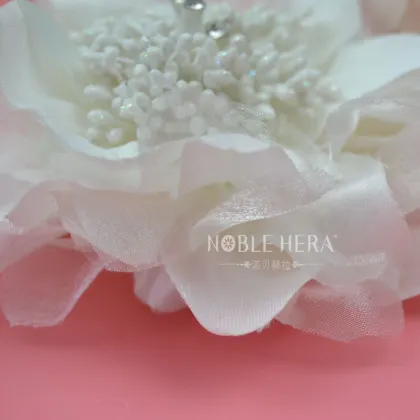 White jewelry pin brooch