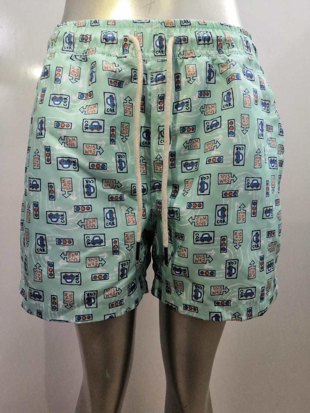 Shorts da spiaggia per icone del cartone animato verde chiaro