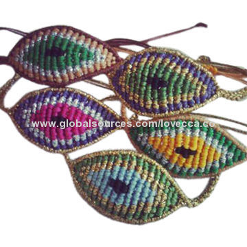 Woven bracelet with evil eye design