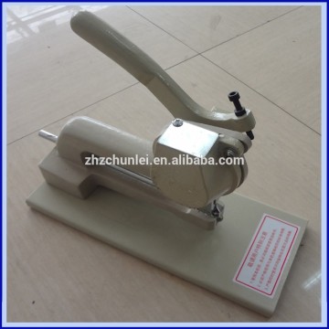 Handbag eyelet machine