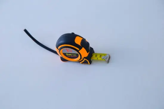 Rubber coated measuring steel tape with grip