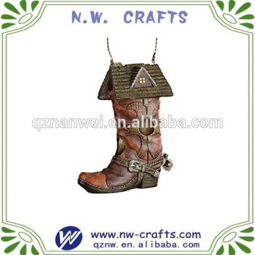 Polyresin boots birdhouse