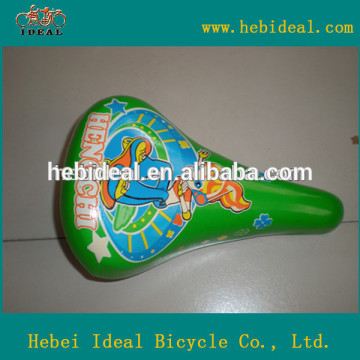 green cover kids bicycle saddle