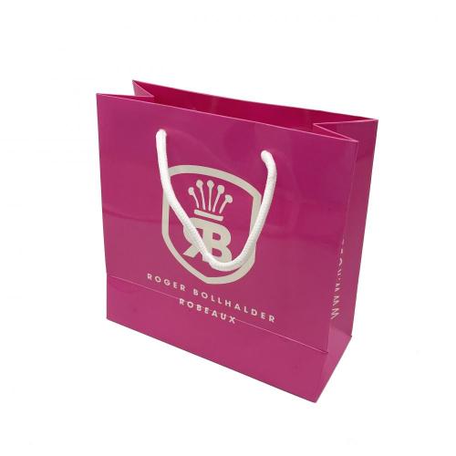 Luksusowe logo niestandardowe błyszcząca różowa torba z papieru prezentowego