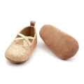 Фабрика OEM лък плосък естествена кожа бебешки обувки